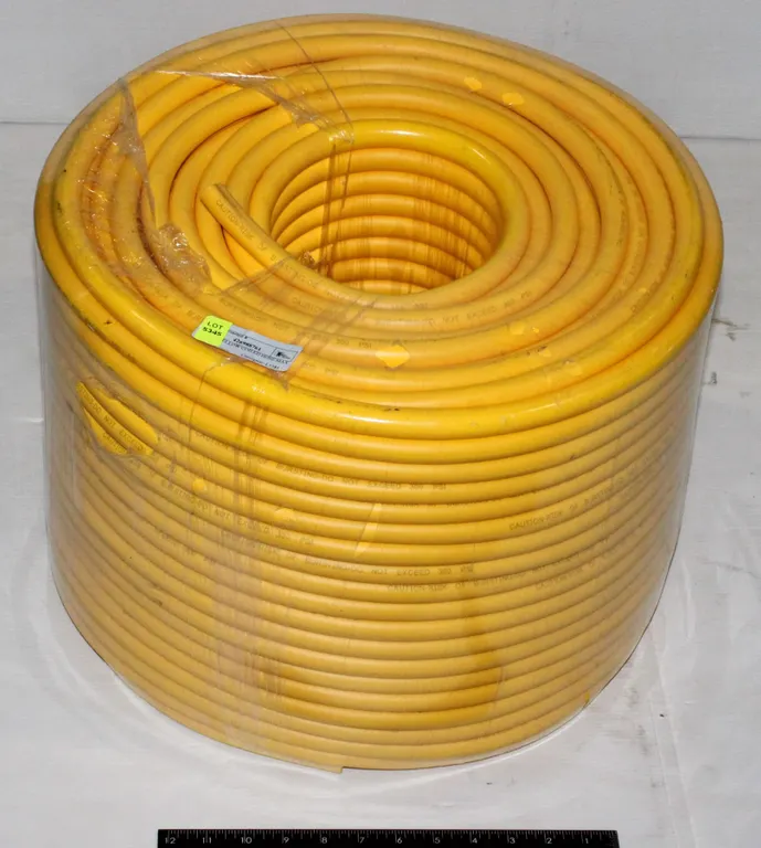 LARGE YELLOW COILED HOSE MAX 300PSI