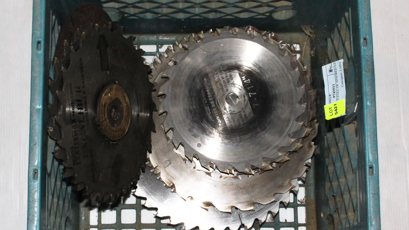 MILK CRATE FULL OF ASSORTED SAW BLADES