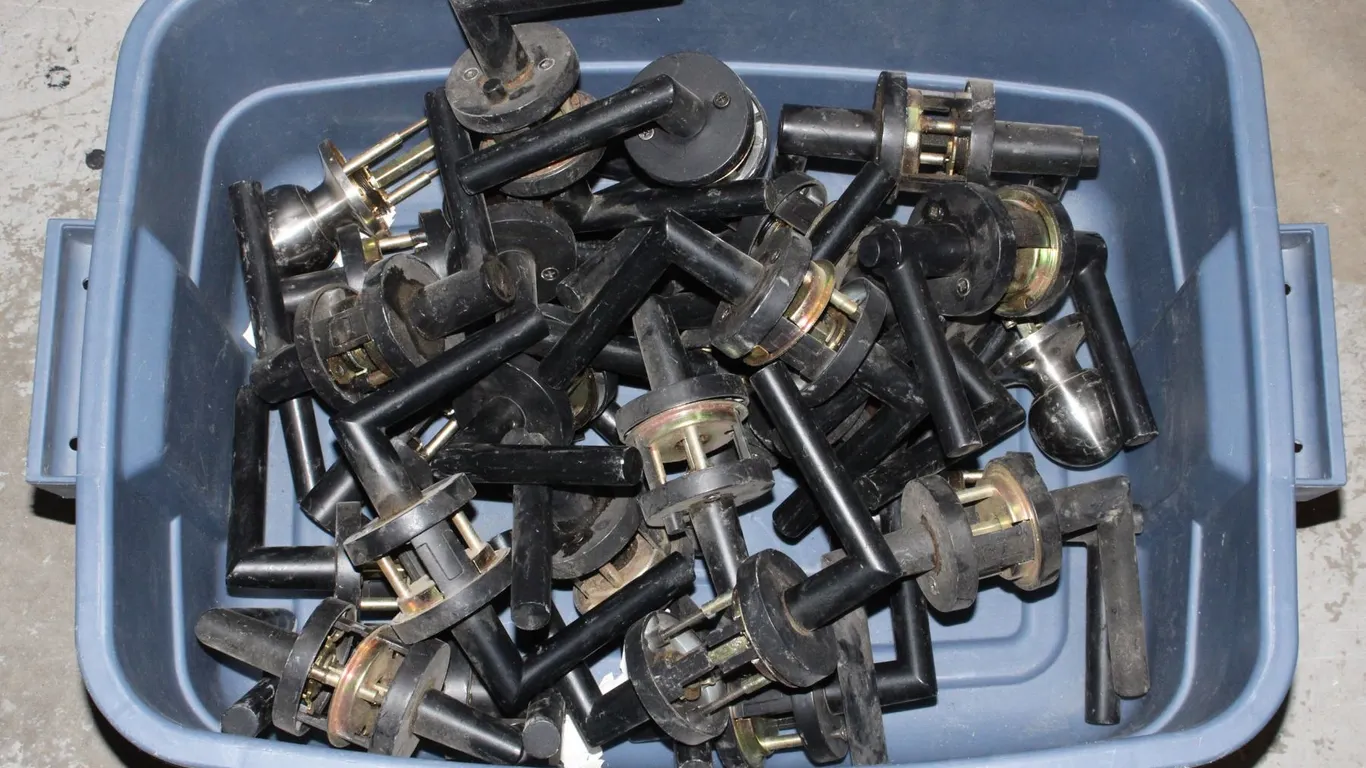 LOT OF DOOR HANDLES, SOLD AS IS