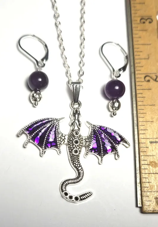 2) SILVER TONE DRAGON WITH PURPLE