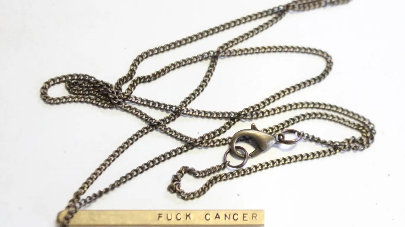 GOLD/BRASS TONE "FUCK CANCER" BAR
