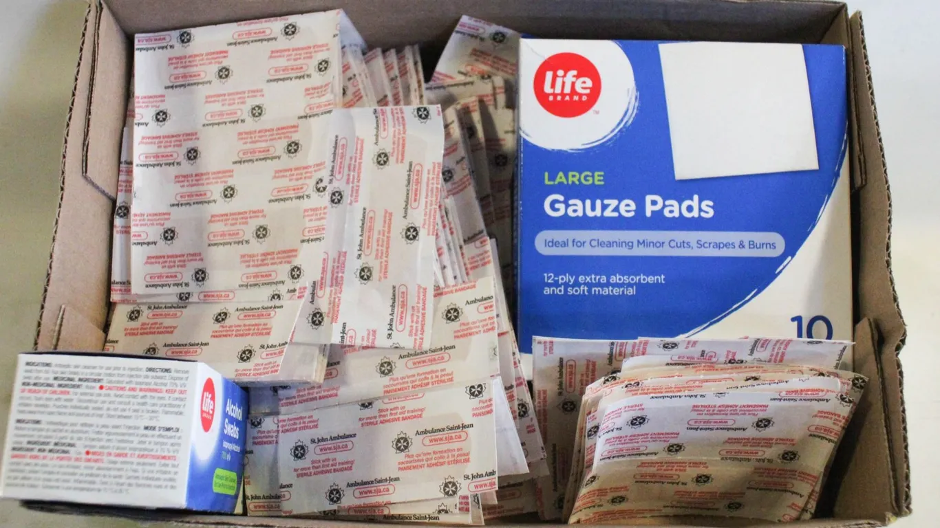 FLAT FULL OF VARIOUS BANDAIDS AND GAUZE