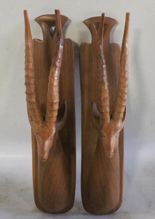 2 CARVED WOOD ANTELOPE HEAD WALL DECOR.