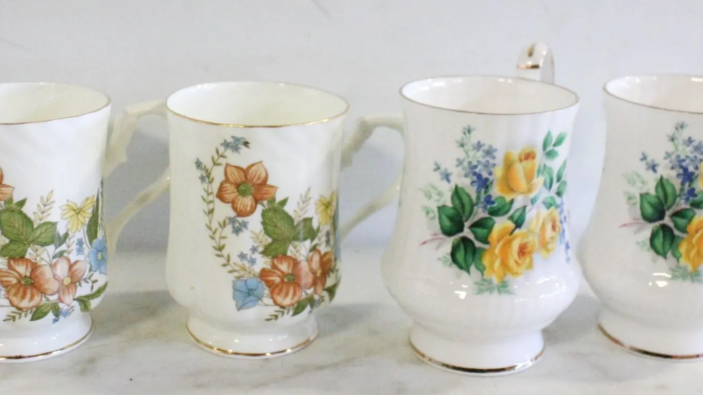 2 VINTAGE PORCELAIN PEDESTAL COFFEE/TEA MUGS