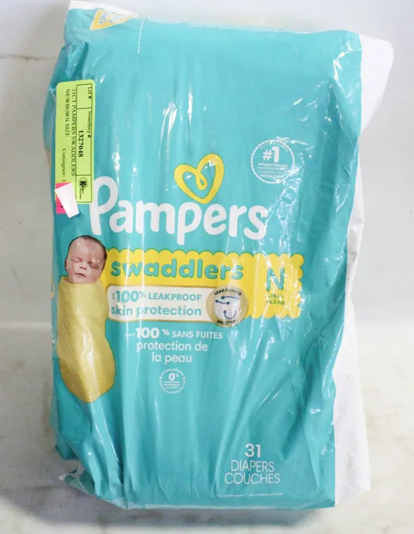 31CT PAMPERS SWADDLERS NEWBORN SIZE