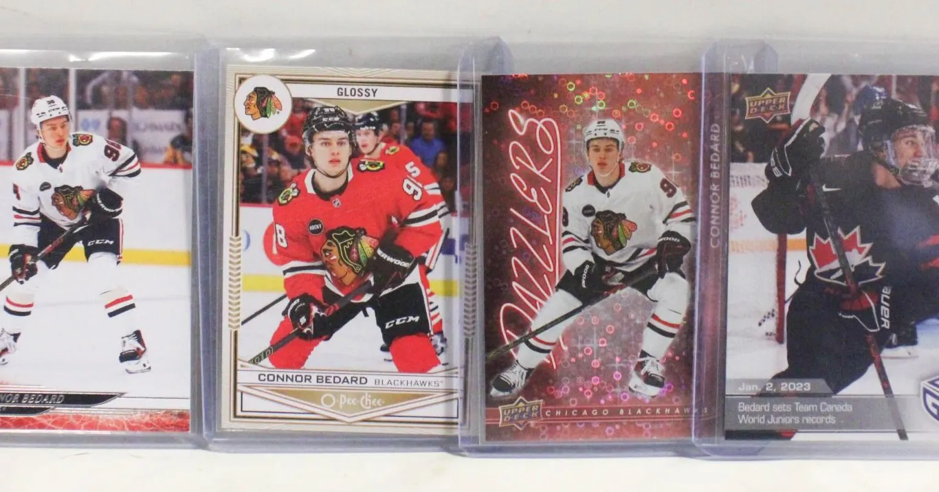 4 CONNOR BEDARD CARDS IN TOP LOADERS
