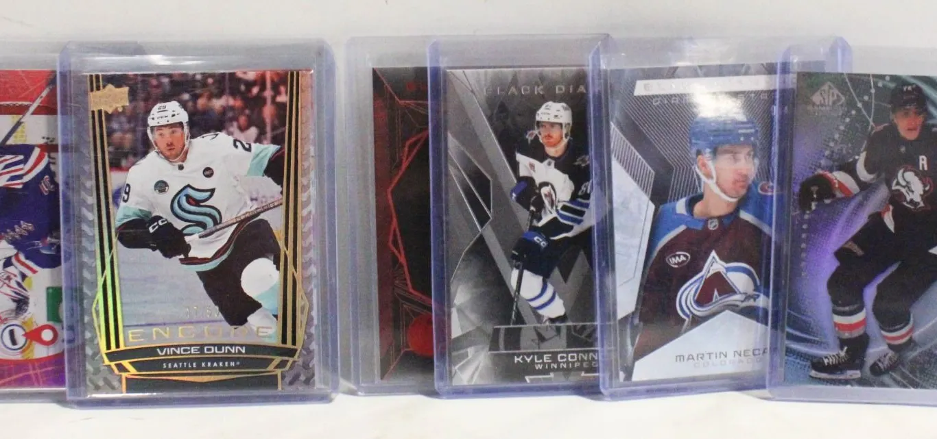7 2025/26 LIMITED NUMBERED CARDS WITH ROOKIES NHL