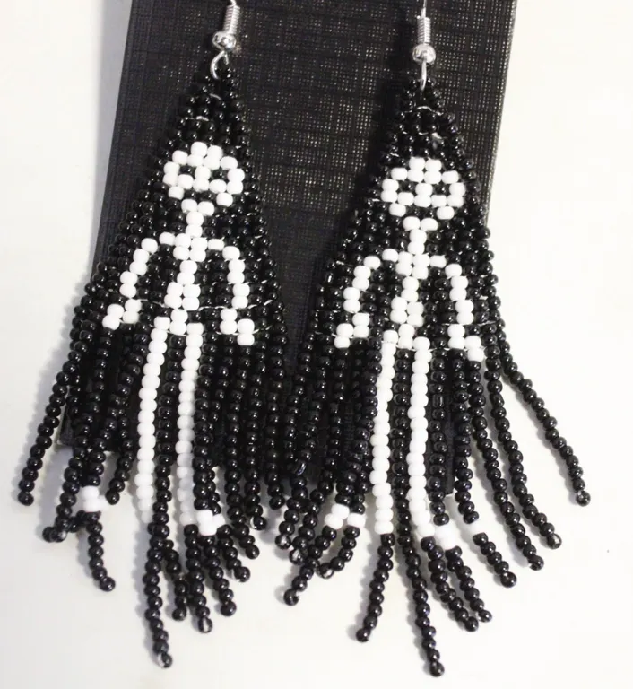 NEW SKELETON RICE BEAD TASSEL EARRINGS