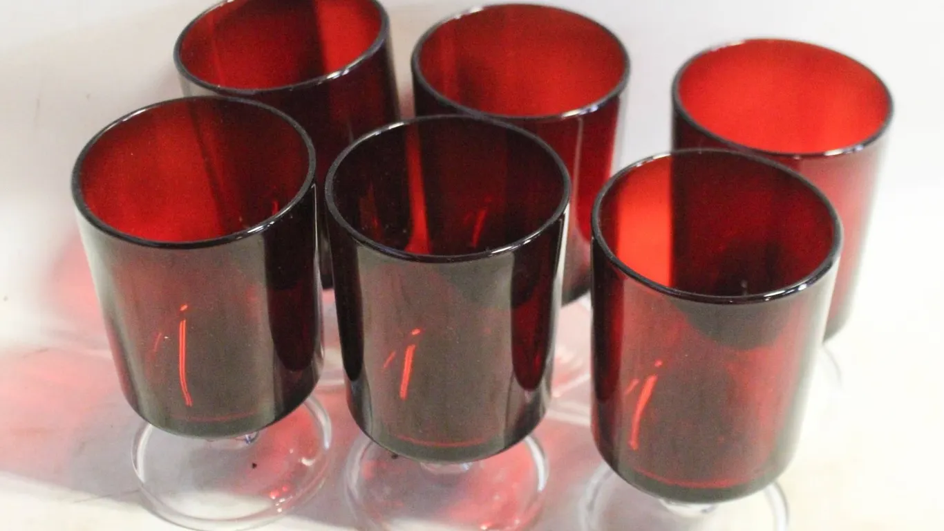 SIX RUBY-RED GLASS LIQUEUR GLASSES