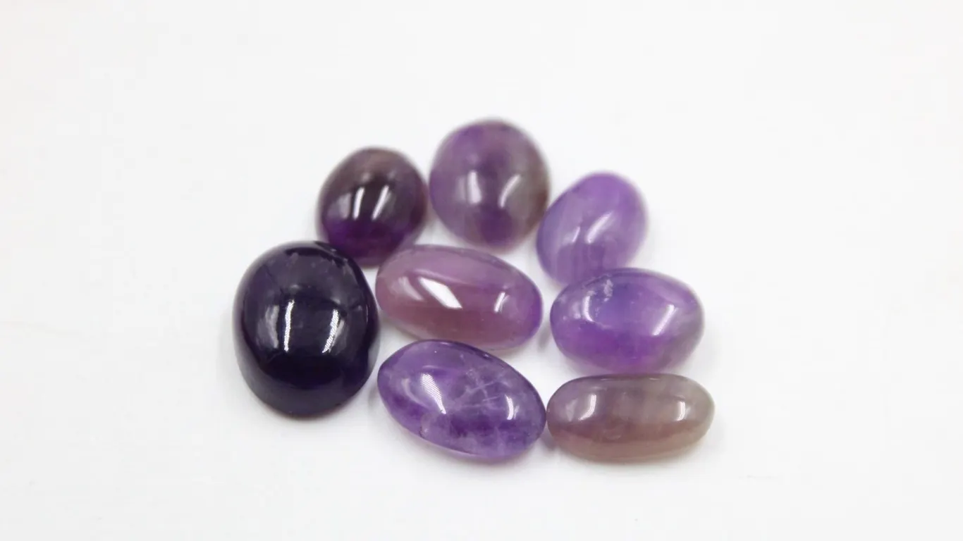 #52-NATURAL AMETHYST GEMSTONES 55.90CT