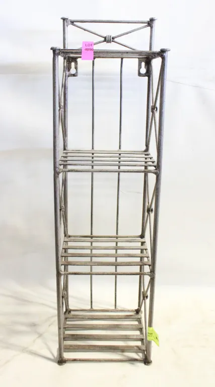 SMALL METAL SHELF. 22 IN