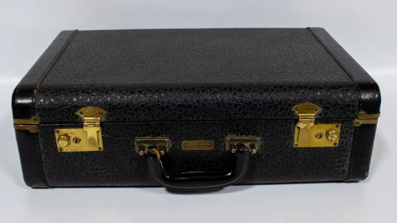 MID CENTURY CANADIAN LEATHER SUITCASE