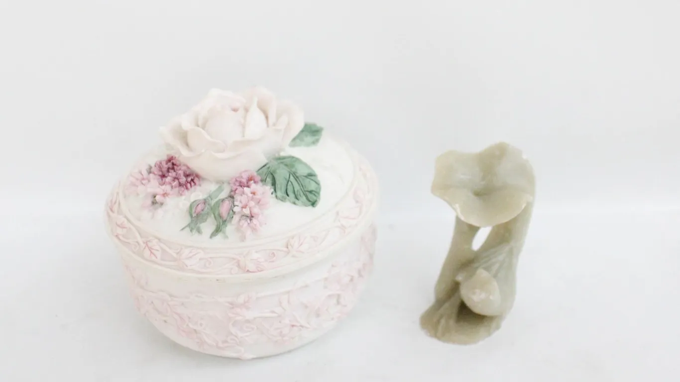 HAND CARVED SOAPSTONE BIRD & PORCEL.