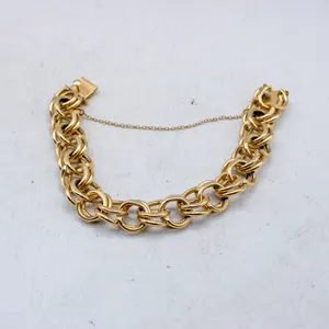 VINTAGE 14KT YELLOW GOLD HOLLOW CHARM BRACELET