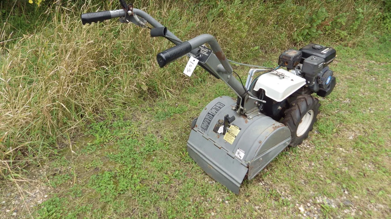 rear tine rototiller with 6 1/2 horsepower power fist motor