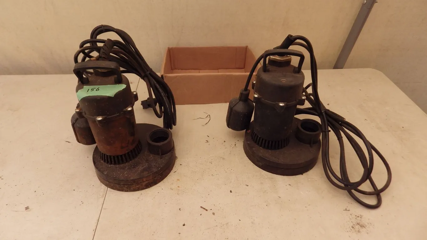 2 used submersible pumps