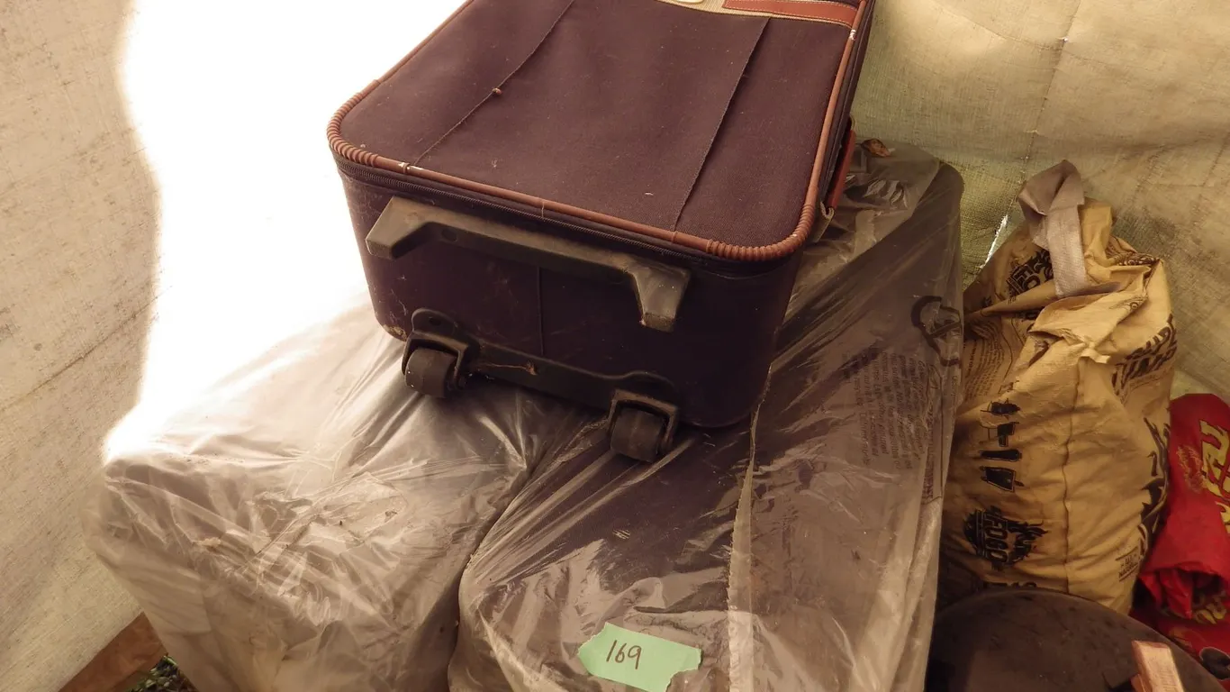 lot of three suitcases