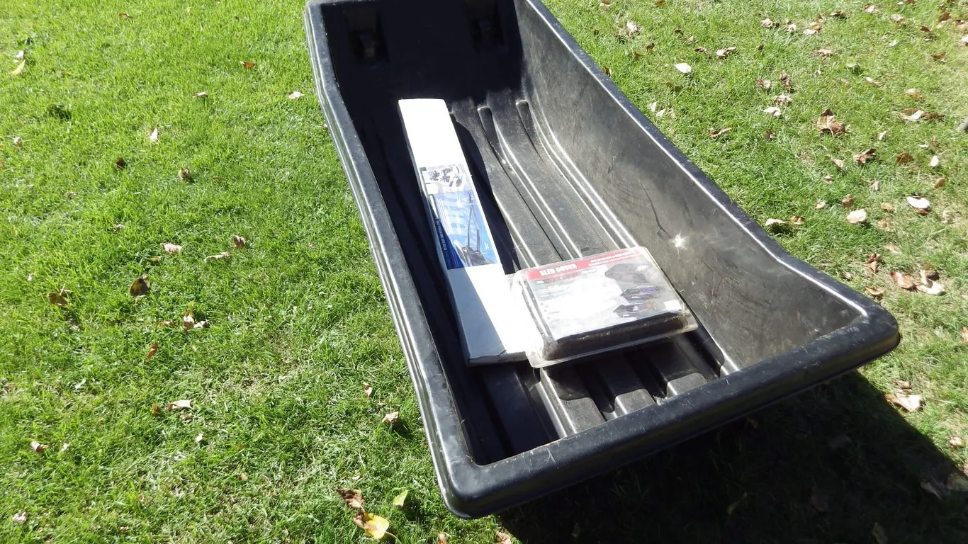 Otter outdoors sled with tow hitch and sled cover