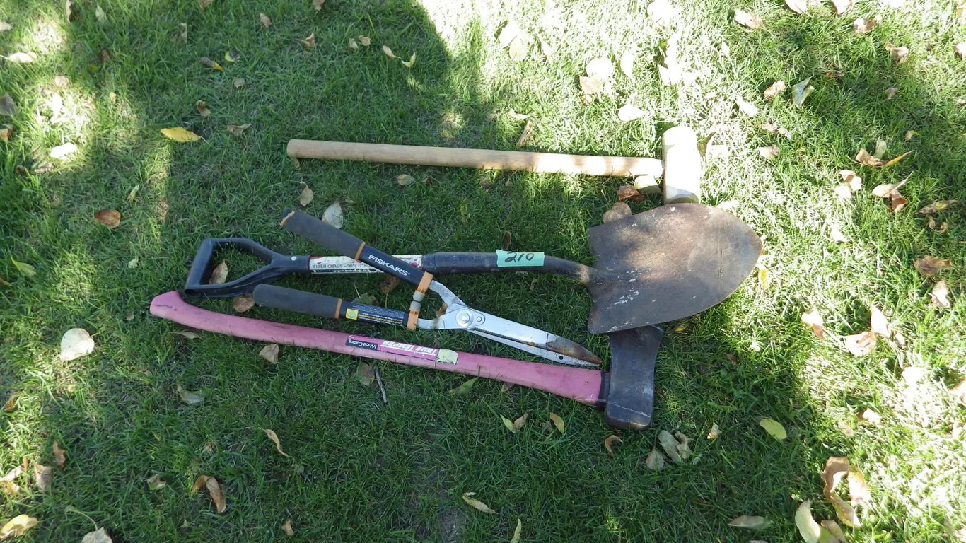 axe, Short handled spade, Sledgehammer and hedge trimmers