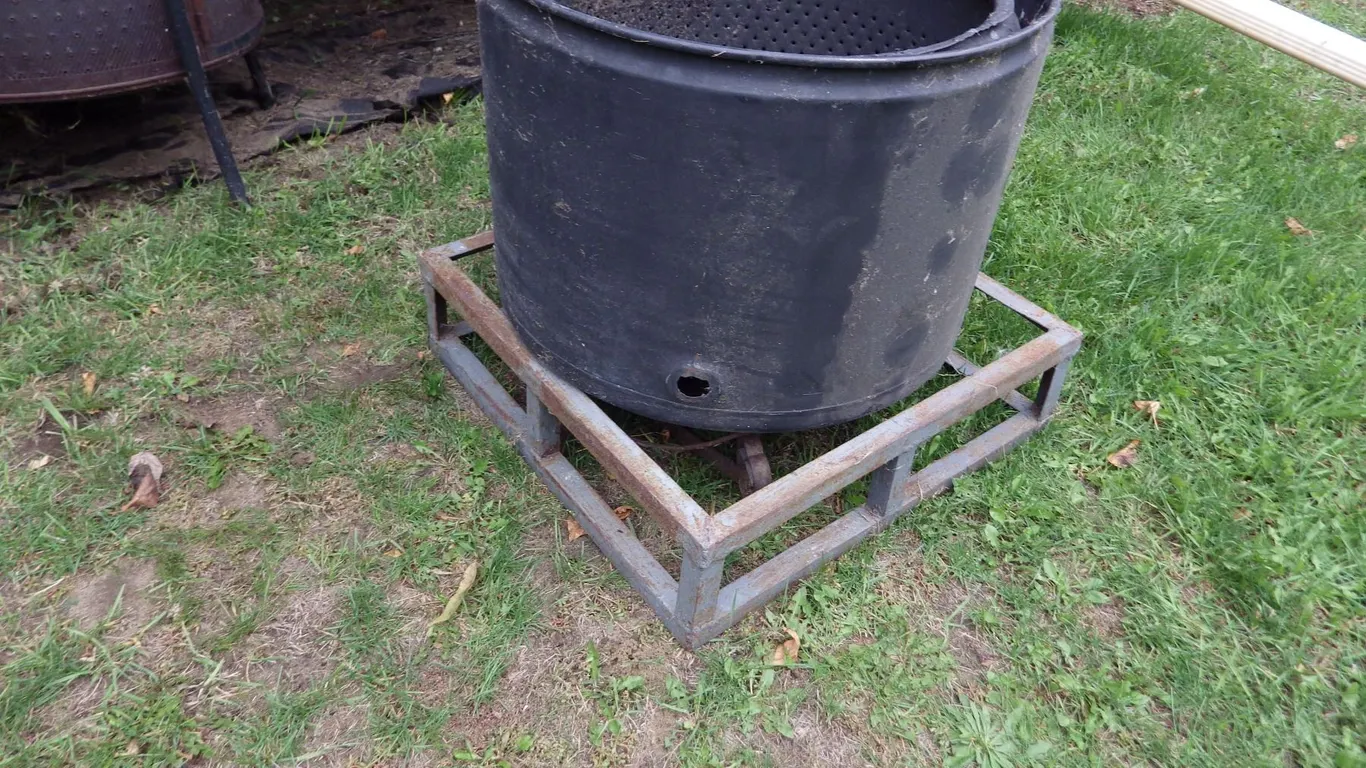 shop built lawn fire pit using dryer tub