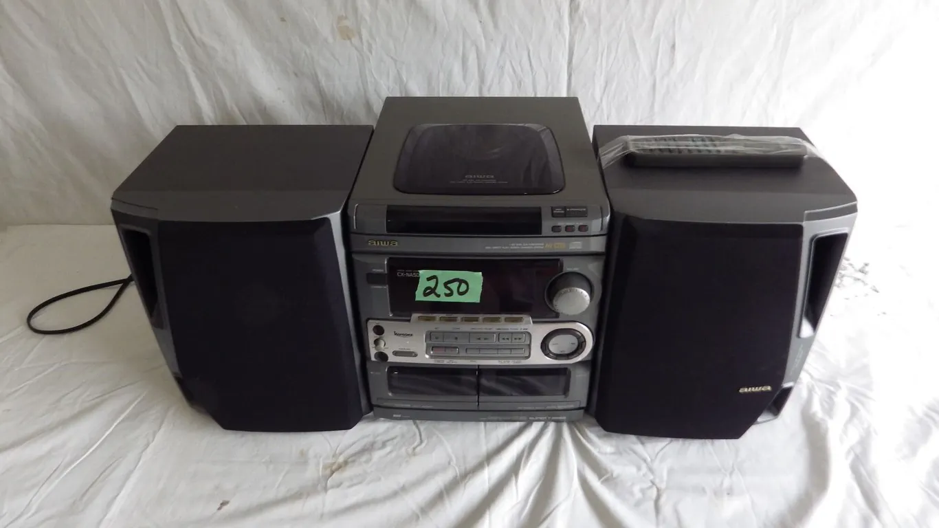 Awai bookshelf stereo AM/FM, cd player, double cassette player, karaoke with remote