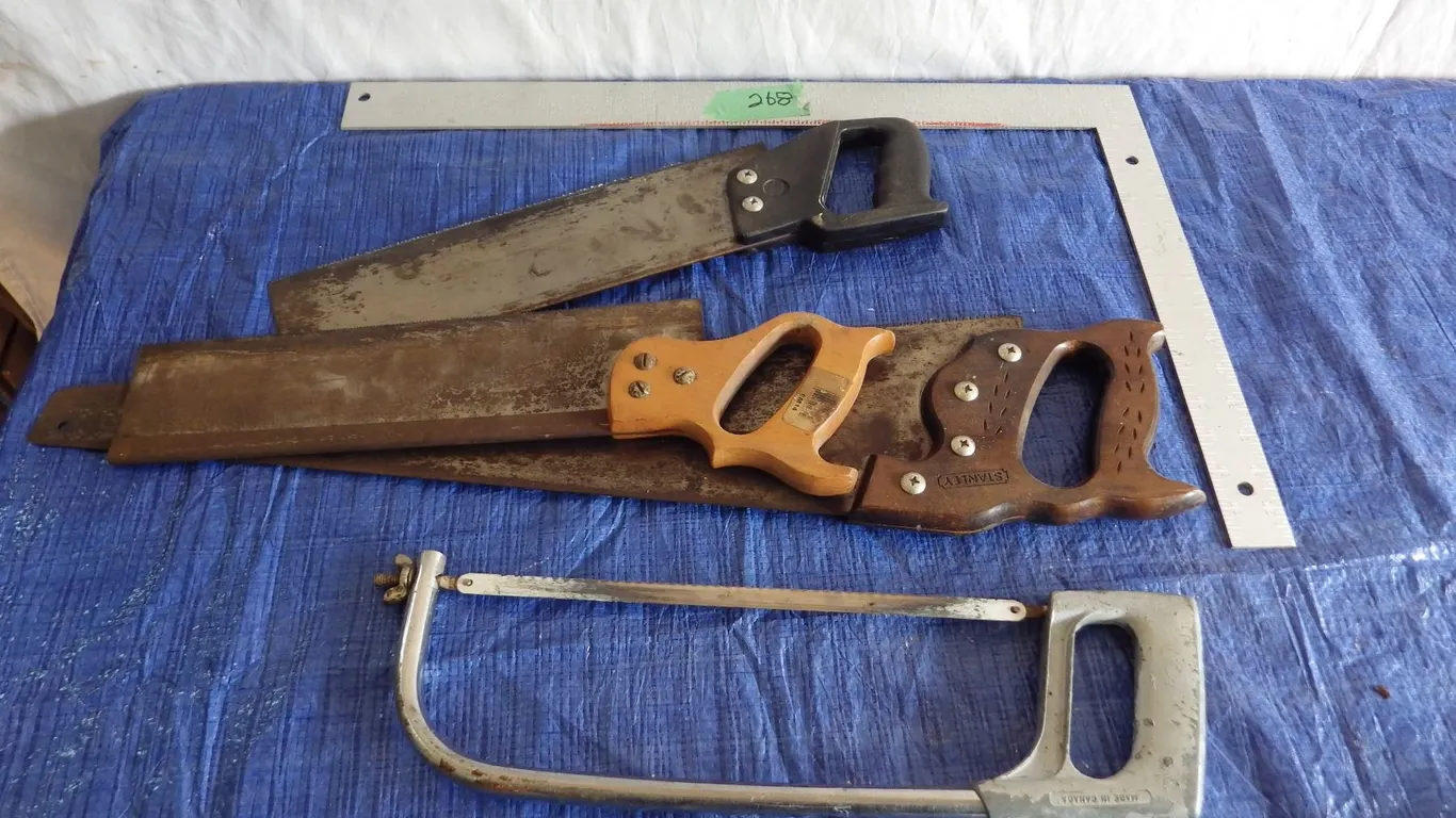 hand tools including saws and framing square