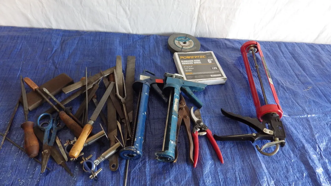 caulking guns and metal files etc