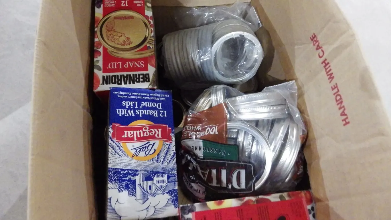 canning lids, sealing rings and misc glass jars