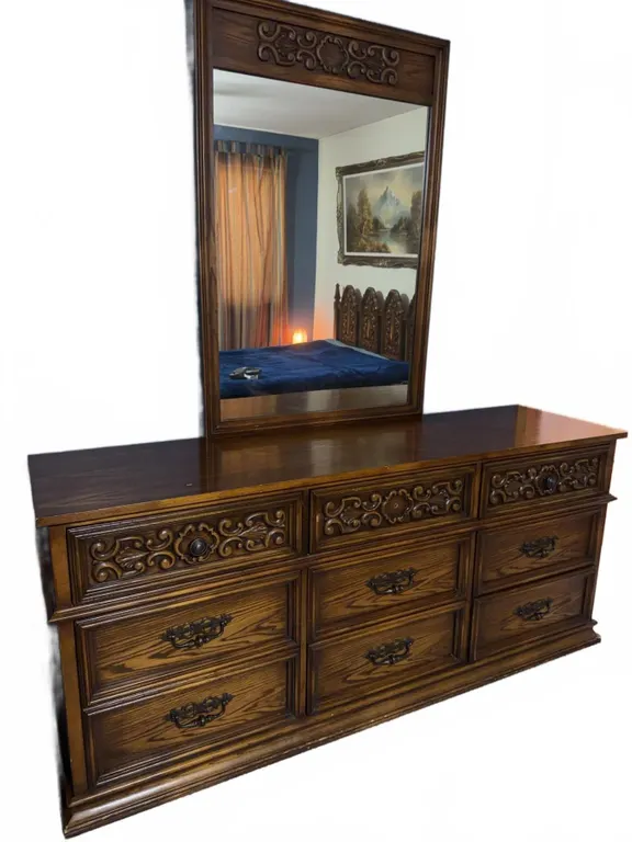 Wood Dresser With Ornate Carved Front, 9 Drawers, and Framed Mirror 33" x 48"