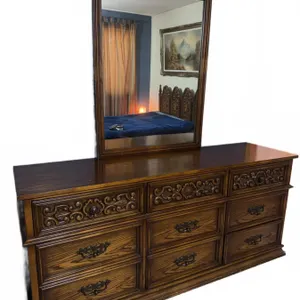 Wood Dresser With Ornate Carved Front, 9 Drawers, and Framed Mirror 33" x 48"
