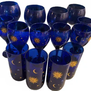 12 Cobalt Blue Glasses with Celestial Sun, Moon and Stars Design