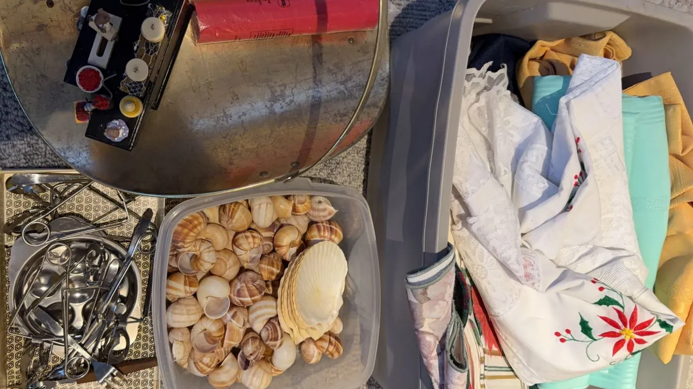 Textiles, Seashells, Metal Tools, and Decorative Miniature Stove