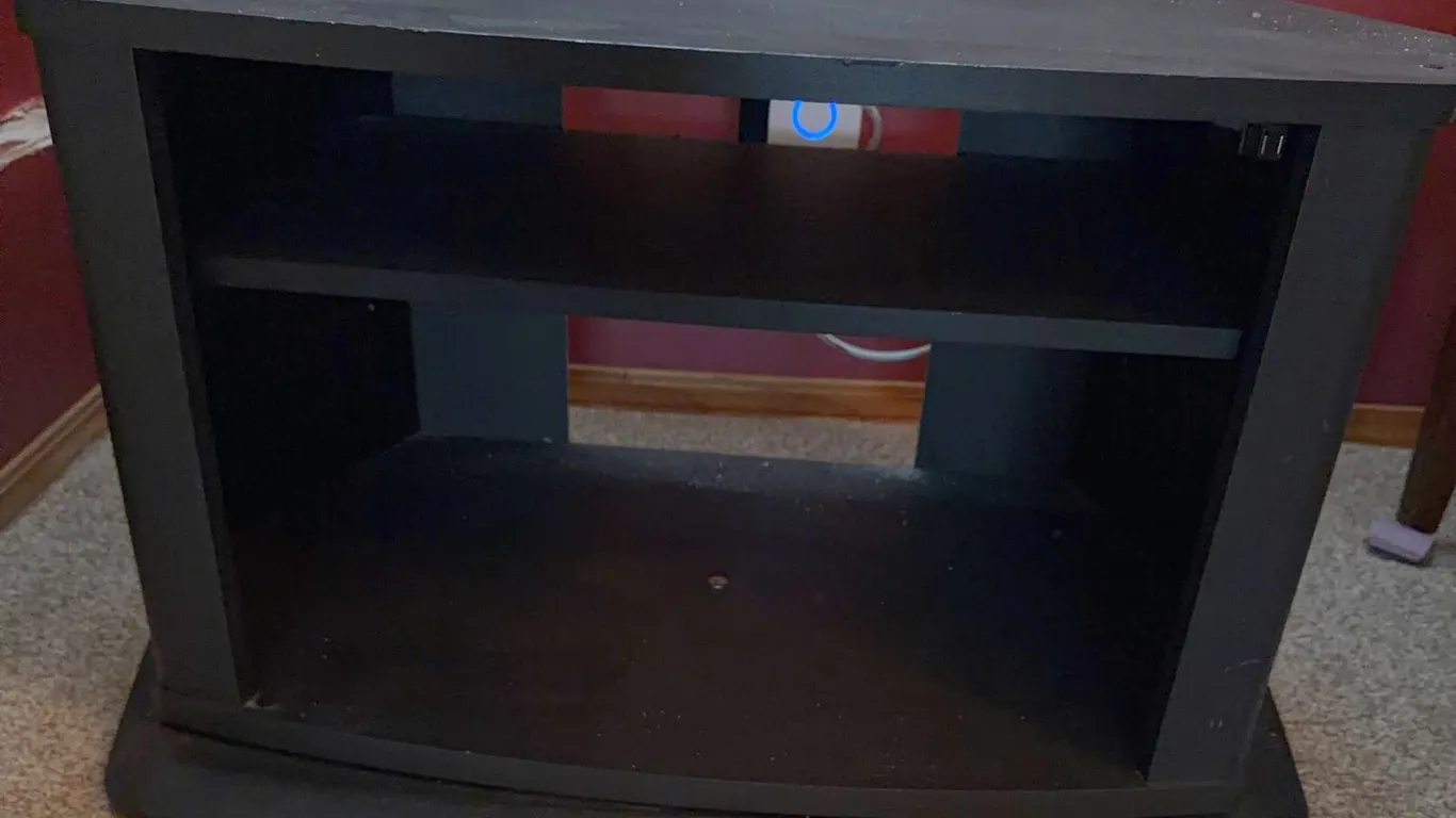 Black Wooden TV Stand with Shelf and Curved Sony Base
