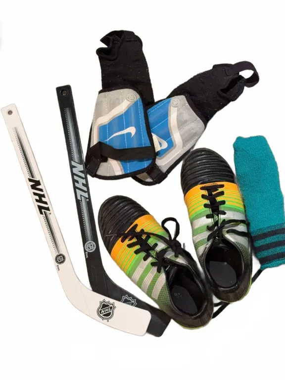 Youth Sports Lot With Adidas Soccer Cleats, Nike Shin Guards, NHL Mini Sticks, Sock Pair