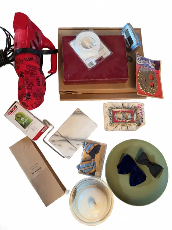 Household Items Including Hair Dryer Bow Ties Picture Frame Plates