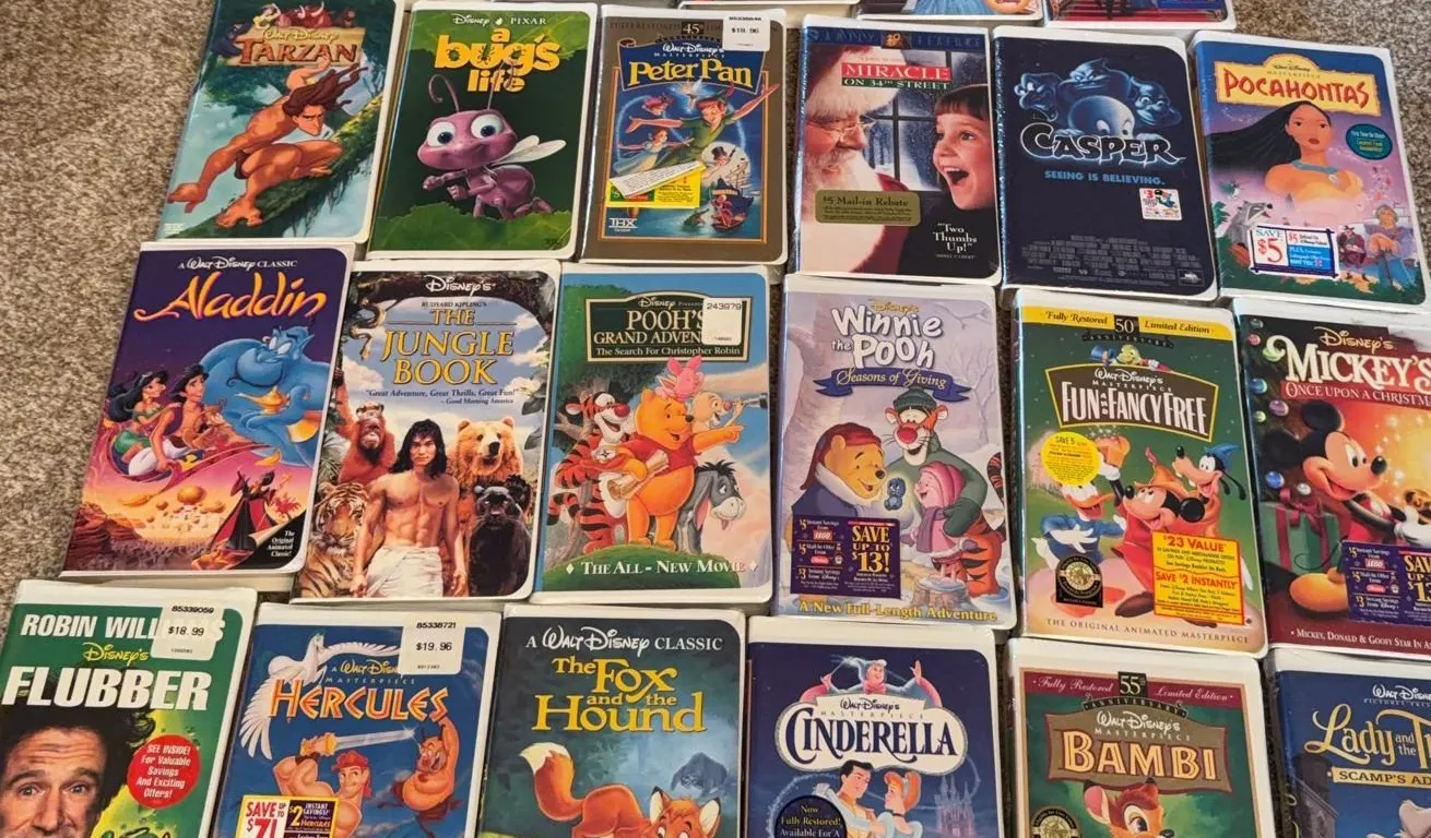 Big Lot of 24 Disney and Family VHS Tapes Including Animated Classics and Live Action Films