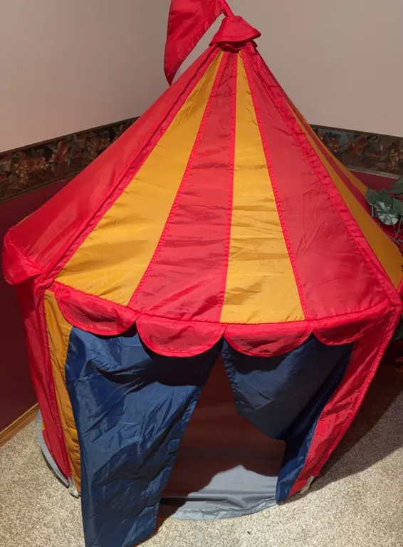 Children's Circus-Themed Play Tent With Red, Yellow, and Blue Panels