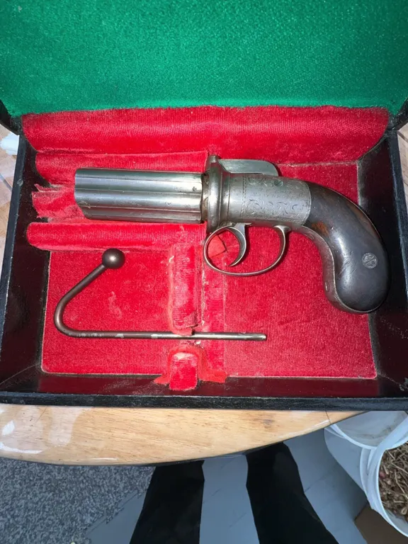 A Fine, Exceptionally Rare Cased British Mid-19th Century Percussion Pepperbox Pistol 6 barrel Revol