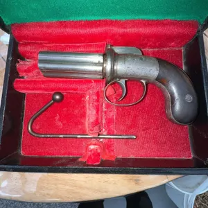 A Fine, Exceptionally Rare Cased British Mid-19th Century Percussion Pepperbox Pistol 6 barrel Revol