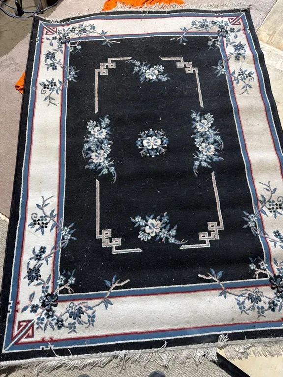 Black and White Floral Pattern Area Rug with Fringes, Measures 86 x 63 Inches