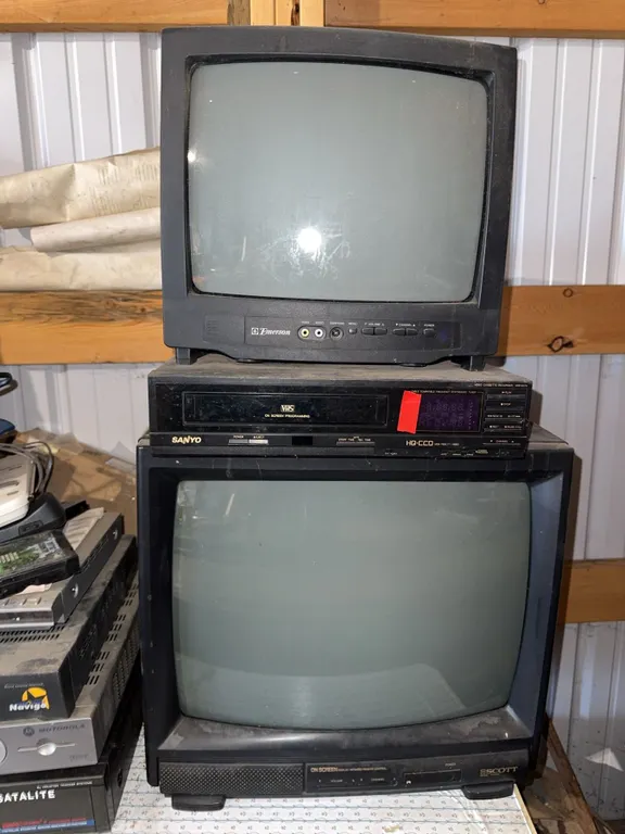 2 CRT TVs, Sanyo VCR, Satellite Receivers, Remotes, and Accessories