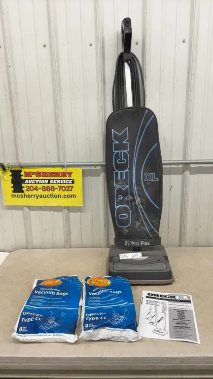 Oreck XL Vaccum with Vacuum Bags and Instructions