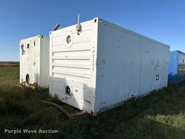 (2) skid mounted tank containers