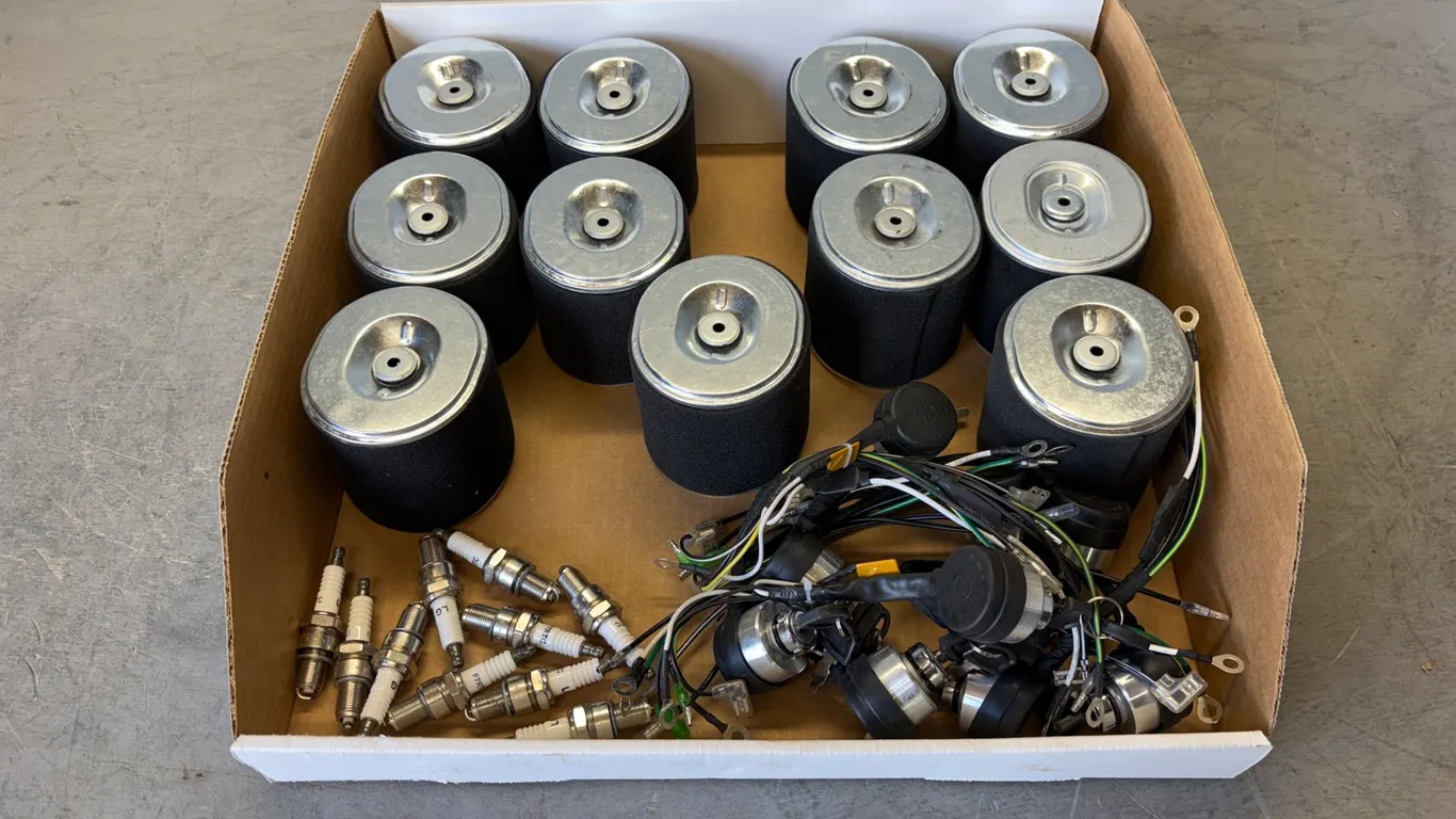 Box of Air Filters, Ignition Switches and Spark Plugs