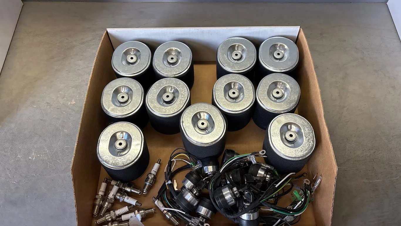 Box of Air Filters, Ignition Switches and Spark Plugs