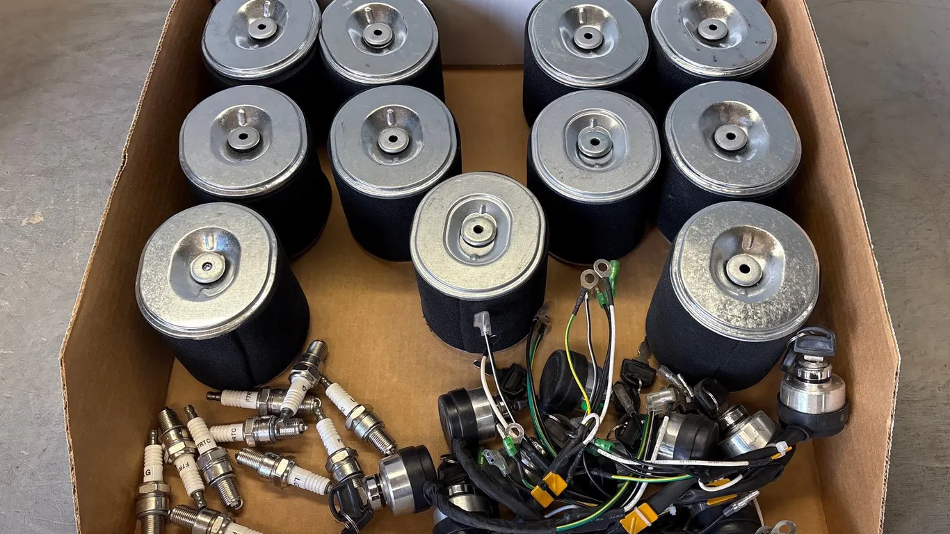 Box of Air Filters, Ignition Switches and Spark Plugs