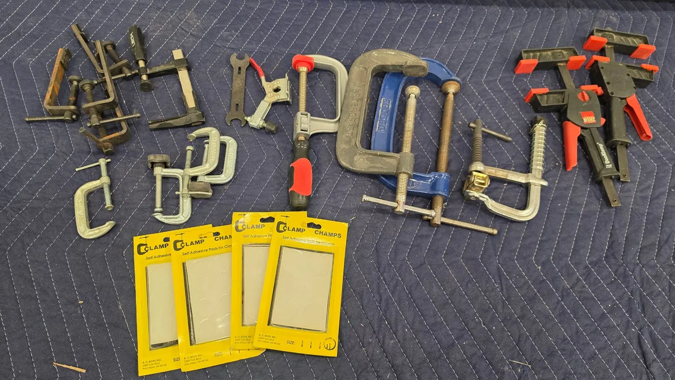 Assorted Clamps And Adhesive Pads