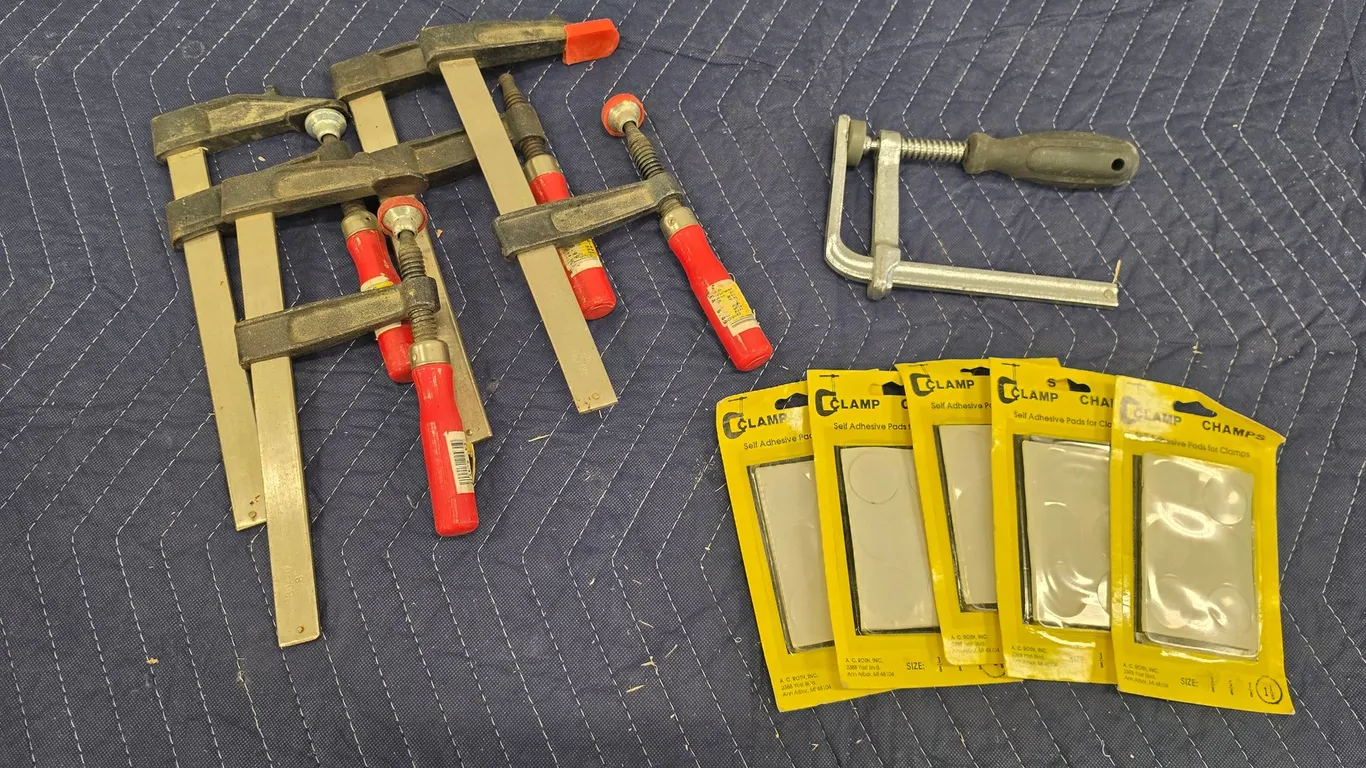 Assorted Clamps And Adhesive Pads