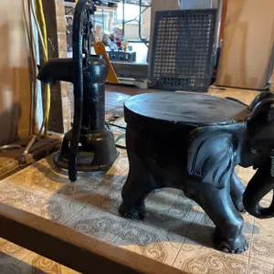 Cast Iron Water Pump and Wood Elephant Plant Stand