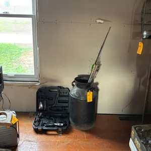 Milk Can, Arrows, and Tools